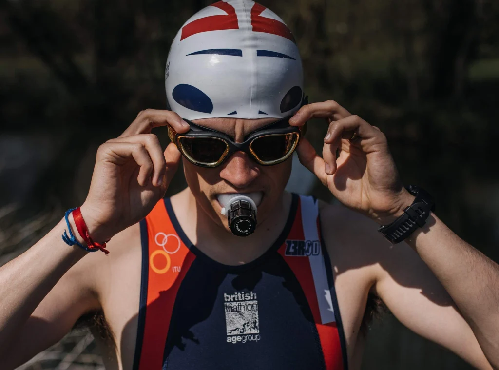Expand-A-Lung breathing trainer used during swimming practice